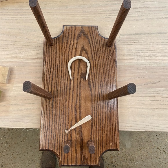 Solid Red Oak and Maple hat rack. Holds 2 western hats/Fedoras and 2 ball caps.